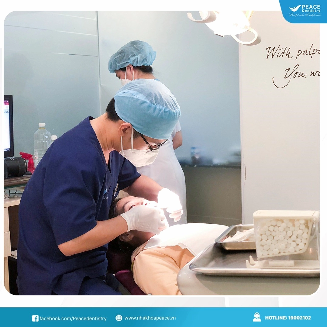 mơ thấy rụng răng cần làm gì